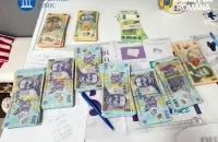 19 de percheziții domiciliare într-un dosar de înșelăciune și spălare de bani